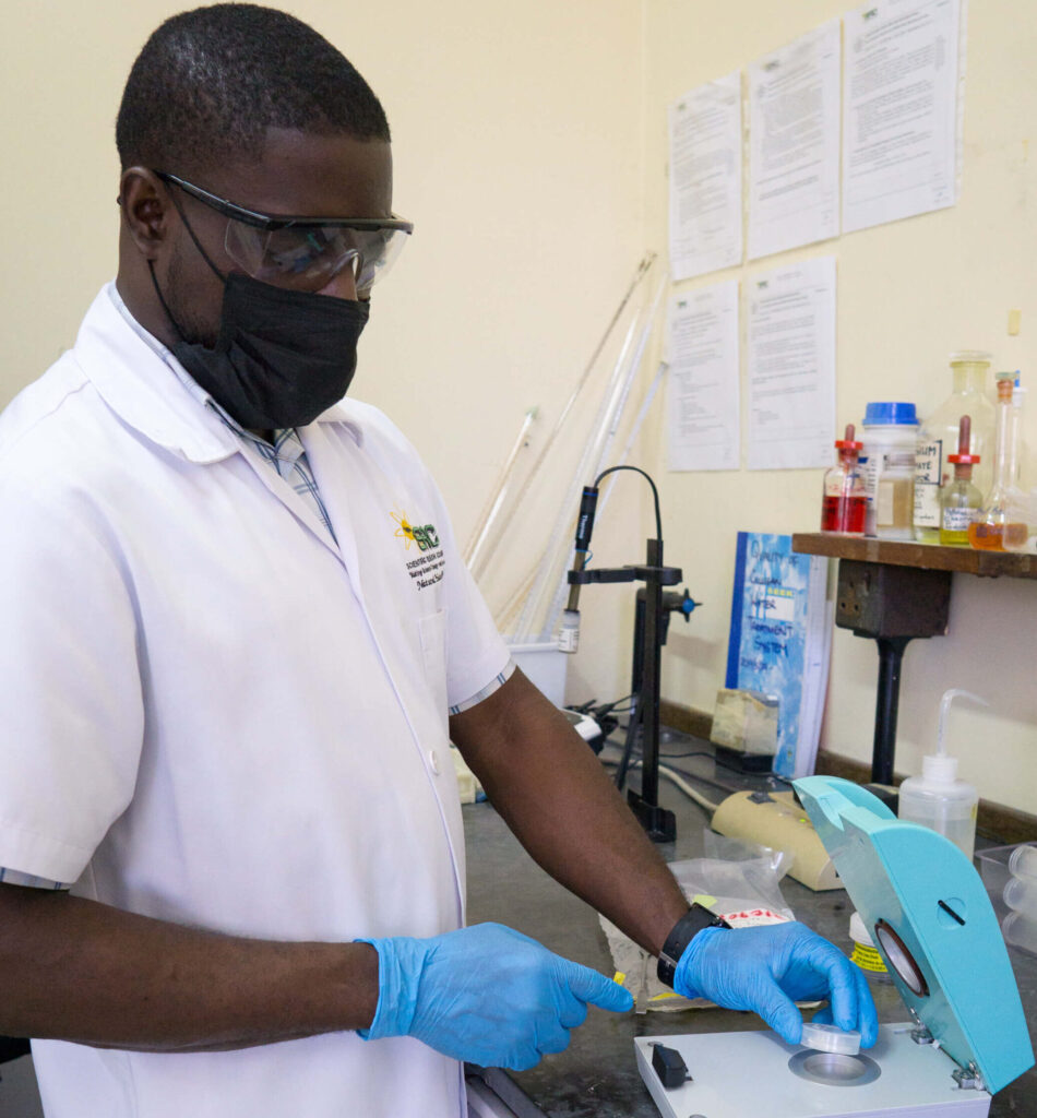 Scientist in laboratory with cannabis samples